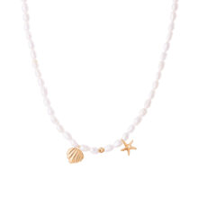گردنبند طلا 18 عیار زنانه با زنجیر مروارید گالری شیدا مجد مدل صدف و ستاره دریایی باروک ریز